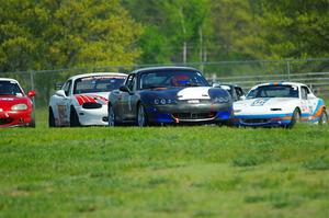 Geoff Youngdahl's Spec Miata Mazda Miata and Nolan Elder's STL Mazda Miata