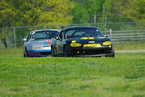 Greg Youngdahl's and Russell King's Spec Miata Mazda Miatas