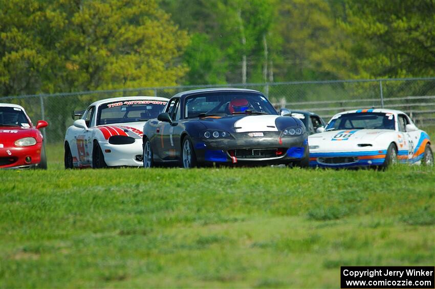 Geoff Youngdahl's Spec Miata Mazda Miata and Nolan Elder's STL Mazda Miata