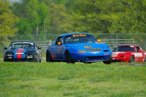 Gordon Kuhnley's, Samantha Silver's and Mitch Welker's Spec Miata Mazda Miatas