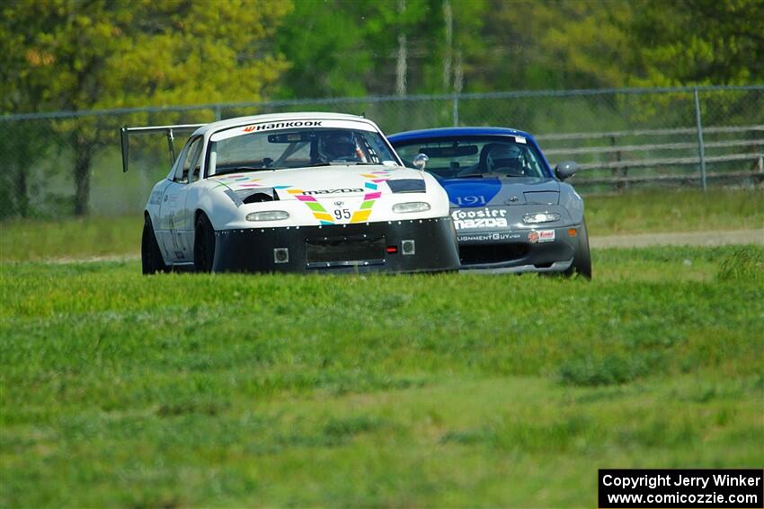 Mark Fitzpatrick's ITJ Mazda Miata and Aaron Jongbloedt's Spec Miata Mazda Miata