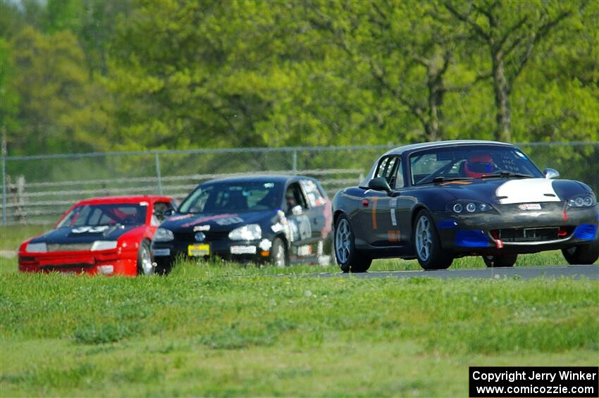 Geoff Youngdahl's Spec Miata Mazda Miata, Tom Daly's T4 VW Rabbit and Terry Orr's GTL Honda Civic