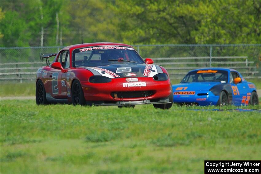 John Elder's STL Mazda Miata and Gordon Kuhnley's Spec Miata Mazda Miata