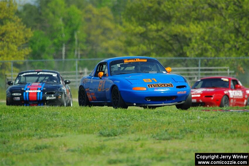 Gordon Kuhnley's, Samantha Silver's and Mitch Welker's Spec Miata Mazda Miatas