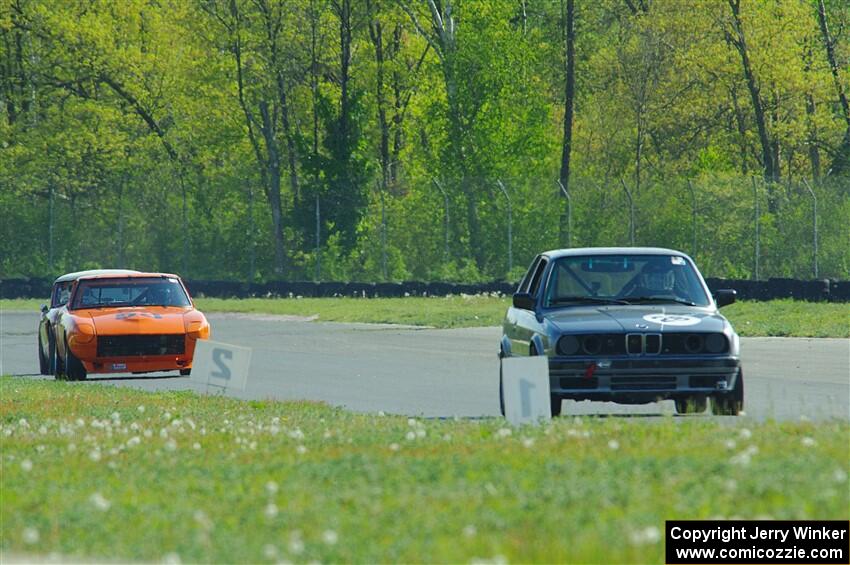 Jessica Johnk's BMW 325i, Tim Homes' Datsun 240Z and Scott McQueen's Austin-Healey 100-6