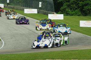 The Radical Cup field streams into turn 3 on lap one of race #1.