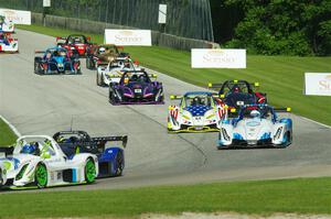 The Radical Cup field streams into turn 3 on lap one of race #1.