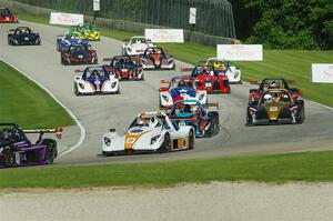 The Radical Cup field streams into turn 3 on lap one of race #1.