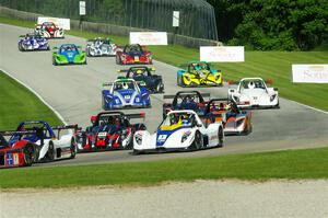 The Radical Cup field streams into turn 3 on lap one of race #1.