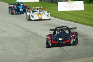 Jon Field's Radical SR10, Reece Everard's Radical SR3 RSX 1500 and Gustavo Rafols' Radical SR3 RSX 1500