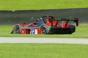 Pius Eigenmann's Radical SR3 RS 1500 pulls off course after turn 3.