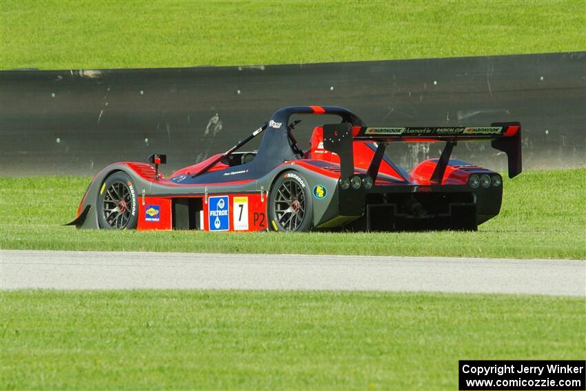 Pius Eigenmann's Radical SR3 RS 1500 pulls off course after turn 3.