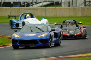 Jon Field's Radical SR10 and Louis Schriber III's Radical SR10 behind the pace car, prior to the red flag.