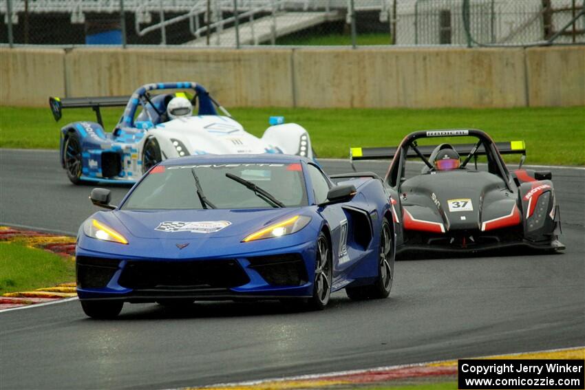 Jon Field's Radical SR10 and Louis Schriber III's Radical SR10 behind the pace car, prior to the red flag.