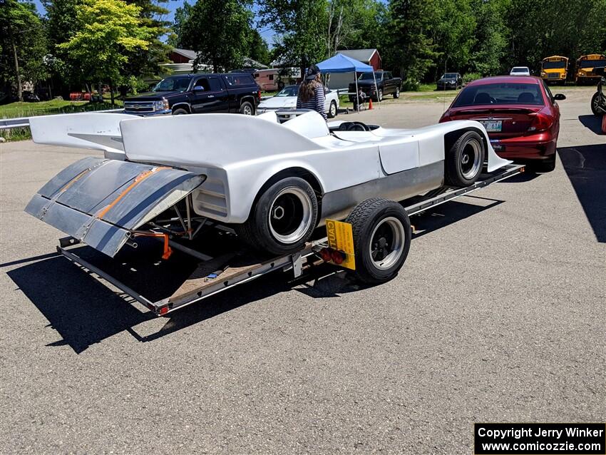 A Porsche 917/10K replicar shows up  before the start of the event.