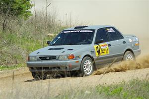 Dexter Clark / Jon McCallie Nissan Sentra SE-R on SS1, J5 North.