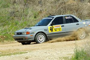 Dexter Clark / Jon McCallie Nissan Sentra SE-R on SS1, J5 North.