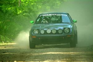 John Gusmano's Mazda RX-7 on SS6, Hill Rd.