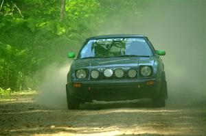 John Gusmano's Mazda RX-7 on SS6, Hill Rd.