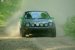 John Gusmano's Mazda RX-7 on SS6, Hill Rd.