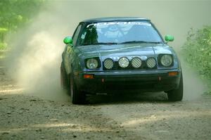 John Gusmano's Mazda RX-7 on SS6, Hill Rd.