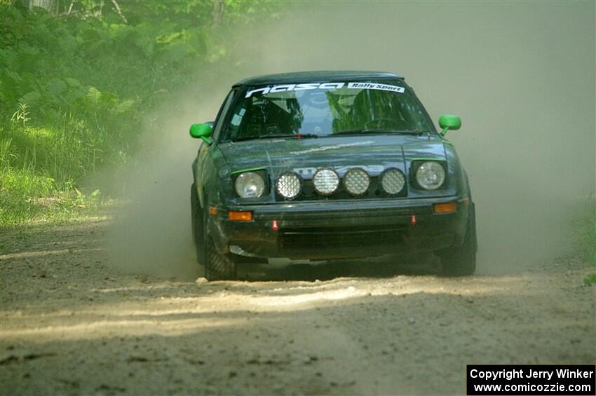 John Gusmano's Mazda RX-7 on SS6, Hill Rd.