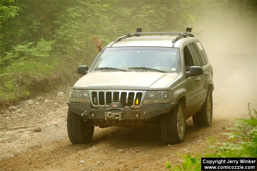 A Jeep Grand Cherokee sweeps SS7, Sand Rd. Long.