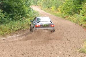 Jordan Locher / Tom Addison Subaru Impreza 2.5RS on SS1, Steamboat I.