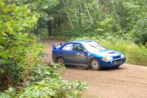 Dmitri Kishkarev / Keegan Helwig Mitsubishi Lancer Evo IV on SS1, Steamboat I.