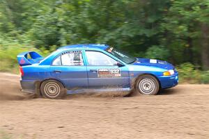 Dmitri Kishkarev / Keegan Helwig Mitsubishi Lancer Evo IV on SS1, Steamboat I.