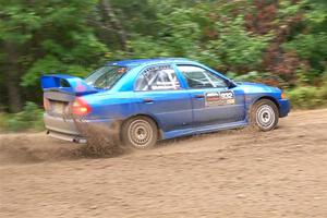 Dmitri Kishkarev / Keegan Helwig Mitsubishi Lancer Evo IV on SS1, Steamboat I.