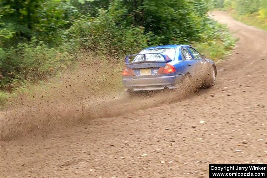 Dmitri Kishkarev / Keegan Helwig Mitsubishi Lancer Evo IV on SS1, Steamboat I.