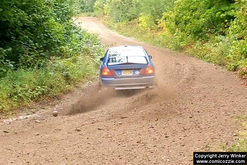 Dmitri Kishkarev / Keegan Helwig Mitsubishi Lancer Evo IV on SS1, Steamboat I.