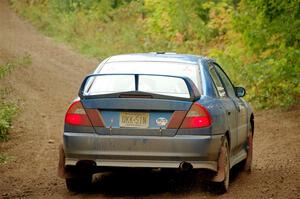 Dmitri Kishkarev / Keegan Helwig Mitsubishi Lancer Evo IV on SS5, Steamboat II.