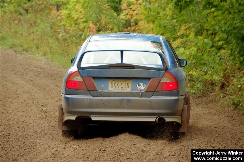 Dmitri Kishkarev / Keegan Helwig Mitsubishi Lancer Evo IV on SS5, Steamboat II.