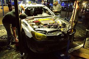 Dave Carapetyan / Adam Kneipp Subaru WRX STi gets some repairs after day one on the stages.