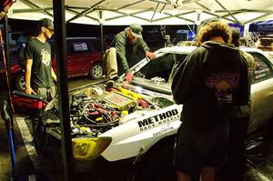 Dave Carapetyan / Adam Kneipp Subaru WRX STi gets some repairs after day one on the stages.