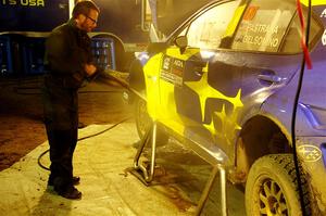 Travis Pastrana / Rhianon Gelsomino Subaru WRX STi is cleaned after day one on the stages.