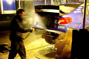 Travis Pastrana / Rhianon Gelsomino Subaru WRX STi is cleaned after day one on the stages.