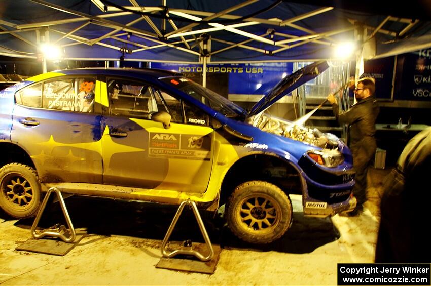 Travis Pastrana / Rhianon Gelsomino Subaru WRX STi is cleaned after day one on the stages.