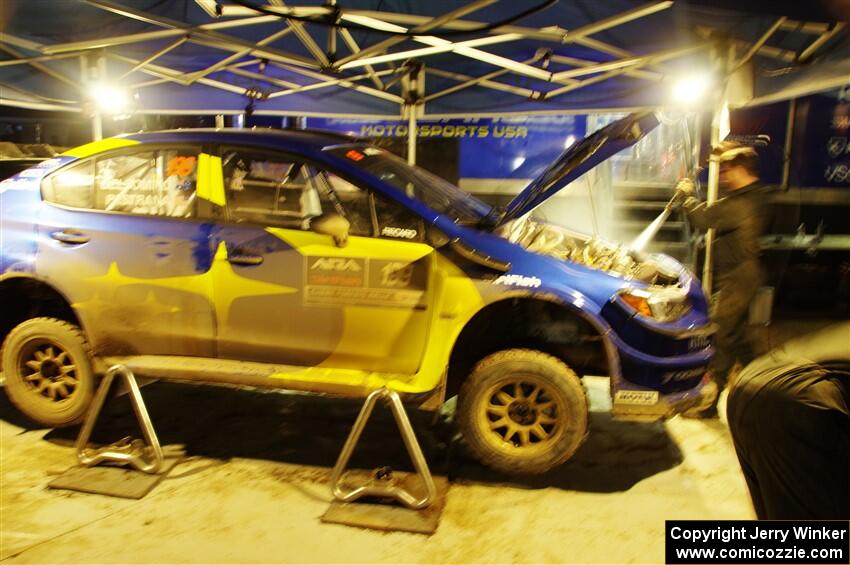 Travis Pastrana / Rhianon Gelsomino Subaru WRX STi is cleaned after day one on the stages.