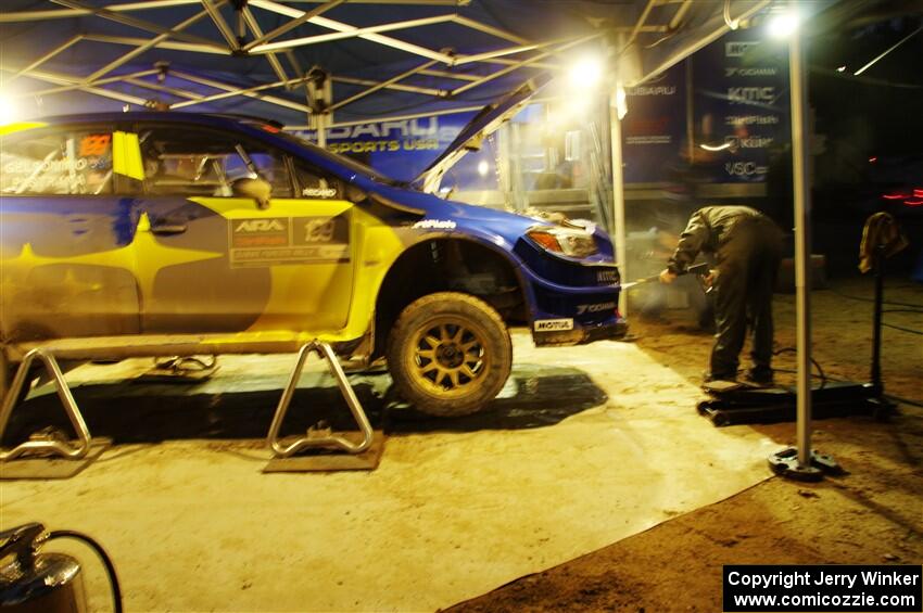 Travis Pastrana / Rhianon Gelsomino Subaru WRX STi is cleaned after day one on the stages.