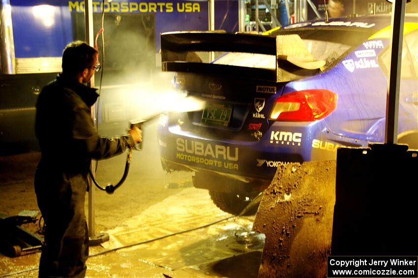 Travis Pastrana / Rhianon Gelsomino Subaru WRX STi is cleaned after day one on the stages.