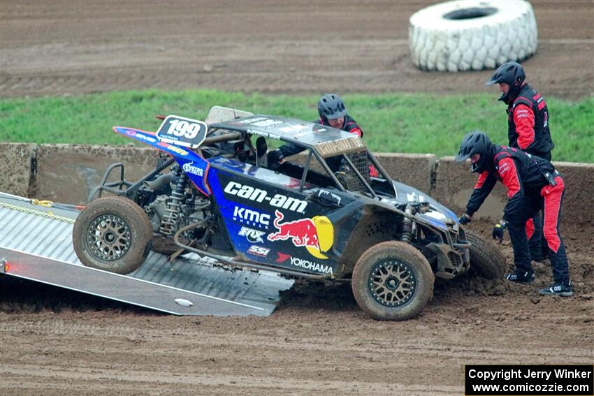 Travis Pastrana's Can-Am Maverick X3 sustains heavy damage and is done for the weekend.