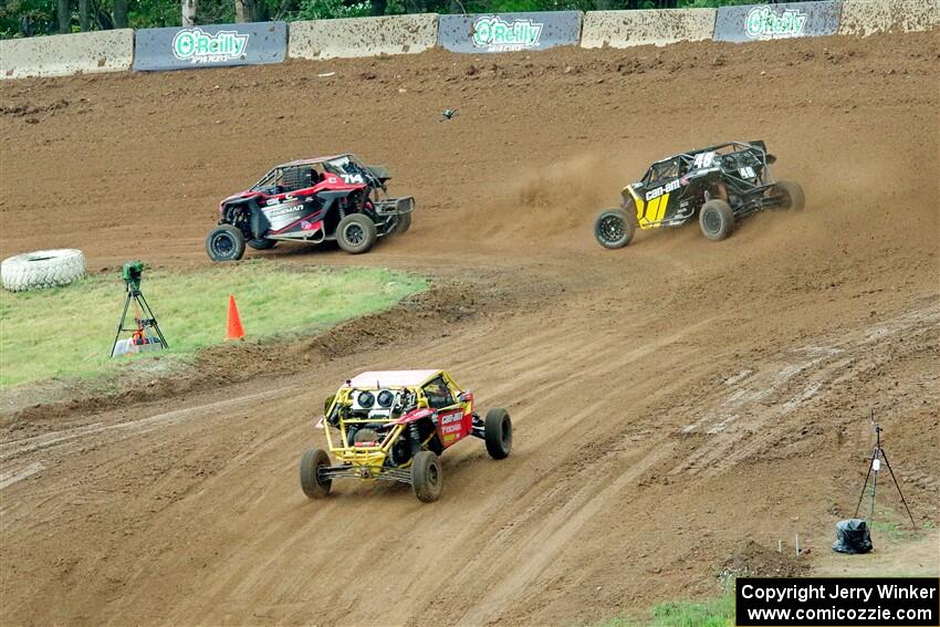 Andy Ives' Polaris RZR, Correy Weller's Can-Am Maverick X3 and Mia Chapman's Can-Am Maverick X3