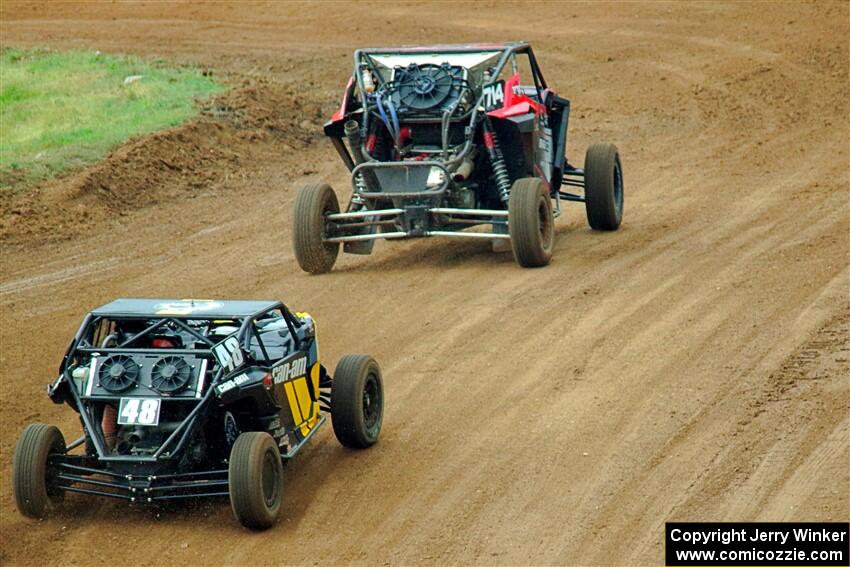 Andy Ives' Polaris RZR and Correy Weller's Can-Am Maverick X3