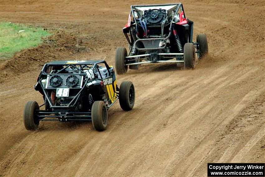 Andy Ives' Polaris RZR and Correy Weller's Can-Am Maverick X3