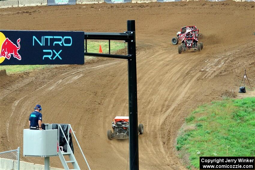 Jack Letourneau's Polaris RZR, Jason Luburgh's Polaris RZR and Catie Munnings' Can-Am Maverick X3