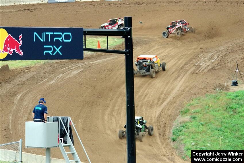 Jack Letourneau's Polaris RZR, Jason Luburgh's Polaris RZR, Catie Munnings' Can-Am Maverick X3 and Tyler Remmereid's Polaris RZR