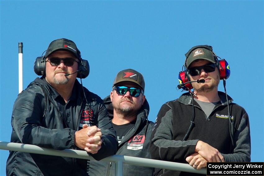 Spotters atop the announcer's booth.